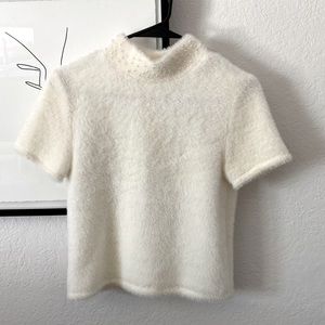 Zara M fuzzy white sweater w/ pearl embellishments on mock turtleneck